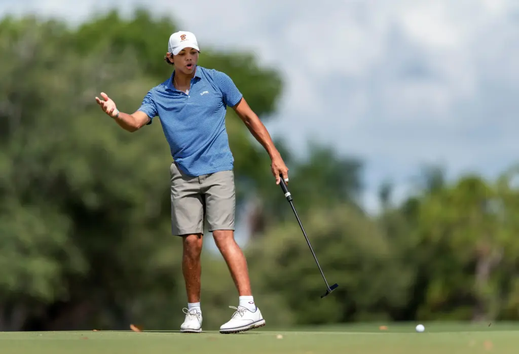 Tiger Woods stands proud beside son Charlie, blazing trails in matching Sun Day Red golf attire