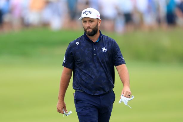 Jon Rahm walking on the golf course