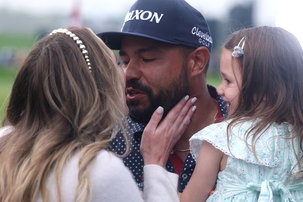 J.J. Spaun celebrating with his wife and daughter after winning the U.S. Open