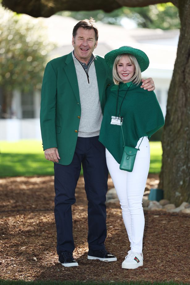 Sir Nick Faldo and wife Lindsay De Marco pose at the 2024 Masters Tournament at Augusta National Golf Club
