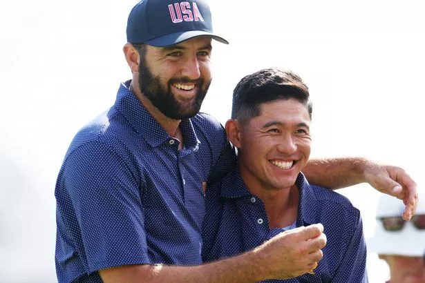 Scottie Scheffler and Collin Morikawa of the U.S. Team celebrate on the 17th green during Saturday Morning Four-Ball on day three of the  2024 Presidents Cup