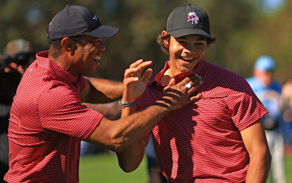 Tiger Woods reacts after his son Charlie Woods holed out on the fourth hole during the second round of the PNC Championship at Ritz-Carlton Golf Club on December 22, 2024 in Orlando, Florida