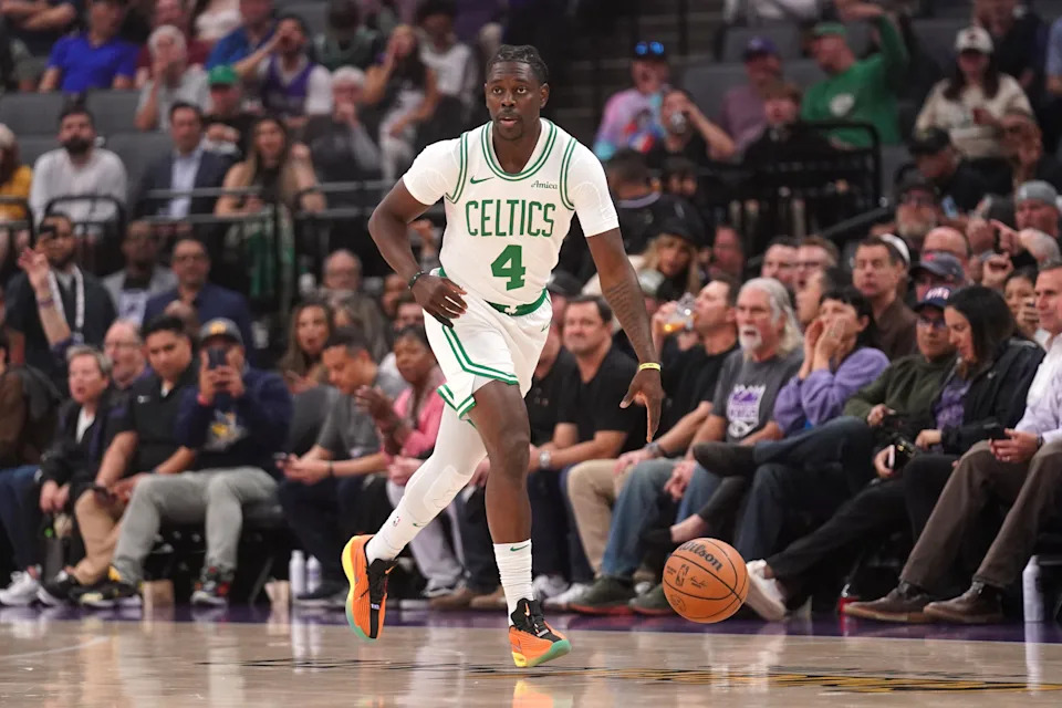Mar 24, 2025; Sacramento, California, USA; Boston Celtics guard Jrue Holiday (4) dribbles the ball against the Sacramento Kings in the first quarter at the Golden 1 Center. Mandatory Credit: Cary Edmondson/Imagn Images