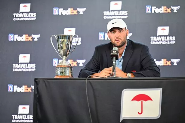 Scottie Scheffler speaking in a press conference after winning the 2024 Travelers Championship