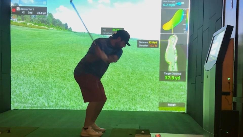 Playing at the Golf VX simulator