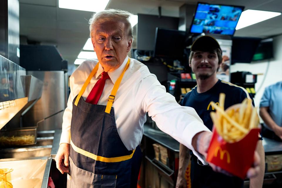 Donald Trump works behind the counter during a campaign event at McDonald's restaurant on October 20, 2024 in Feasterville-Trevose, Pennsylvania (Getty Images)
