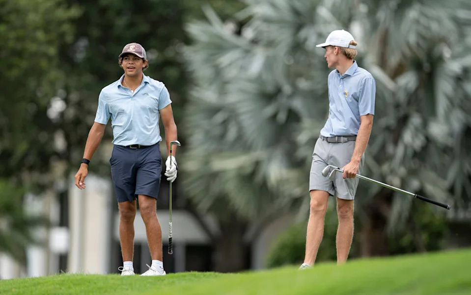Charlie Woods and James Hassell wait to tee off during the first round of the108th Amateur Championship at BallenIsles Country Club on June 5, 2025, in Palm Beach Gardens, Florida.