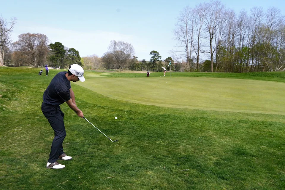 Dominic Mazza of Classical chips a show to the fourth green. La Salle Rams and Classical Purple in high school golf at Triggs Memorial on April 29 2024. [Kris Craig/The Providence Journal]