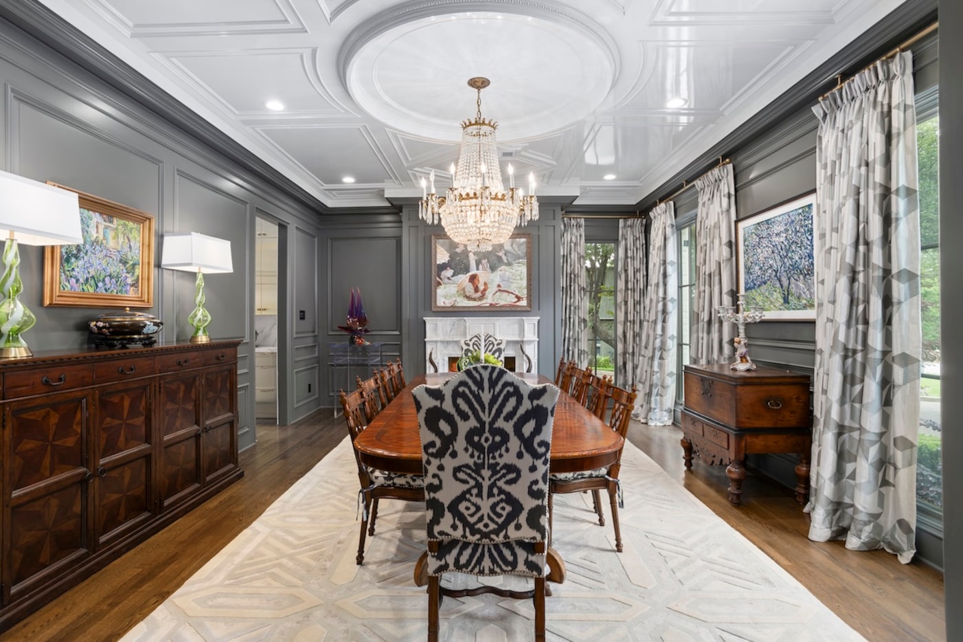A lacquered ceiling in the formal dining room shimmers in the light of the chandelier.