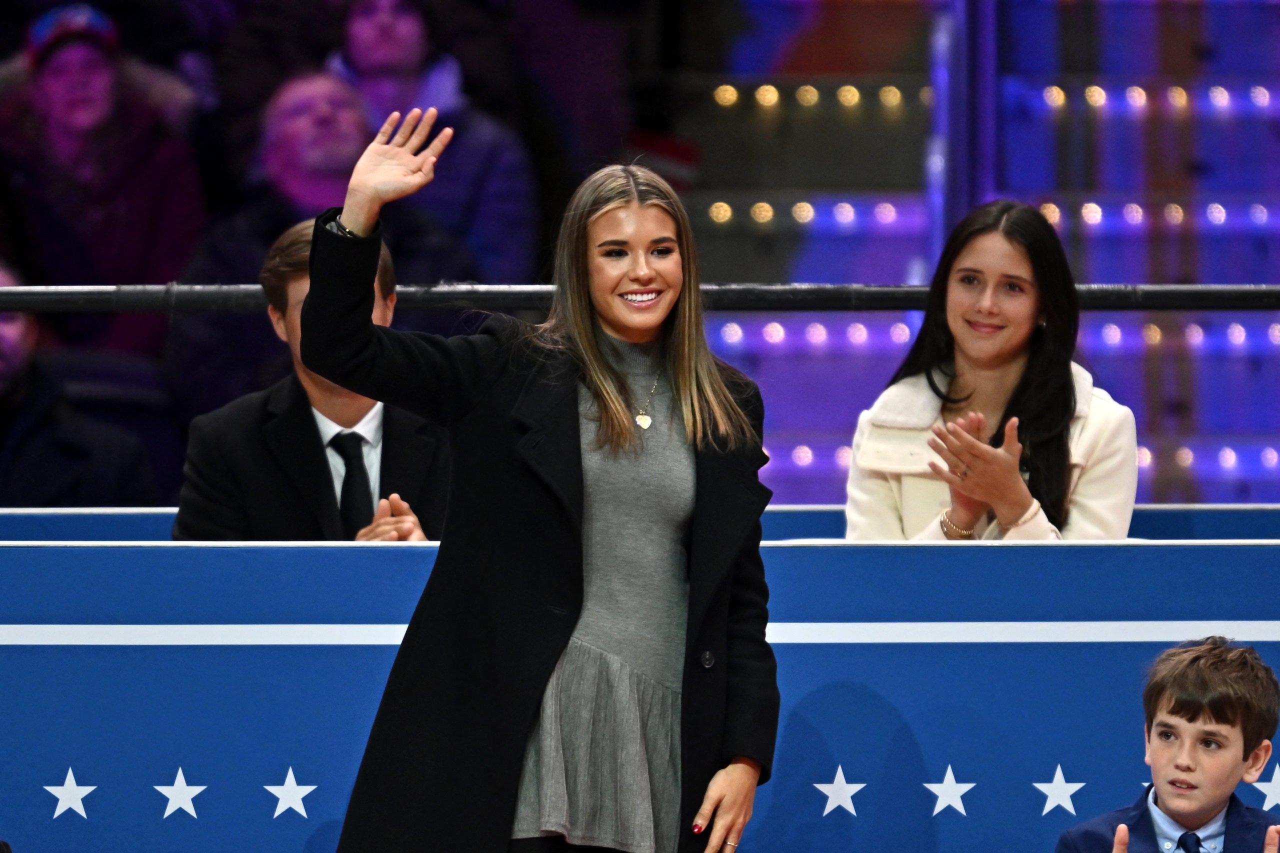 Kai Madison Trump gestures after being acknowledged by his grandfather US President Donald Trump during the inaugural parade inside Capital One Arena, in Washington, DC, on January 20, 2025. (Photo by ANGELA WEISS / AFP) (Photo by ANGELA WEISS/AFP via Getty Images)
