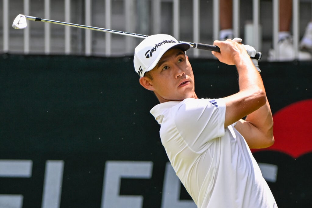 Collin Morikawa hits an iron shot on the eighth hole at TPC River Highlands during round three of the Travelers Championship