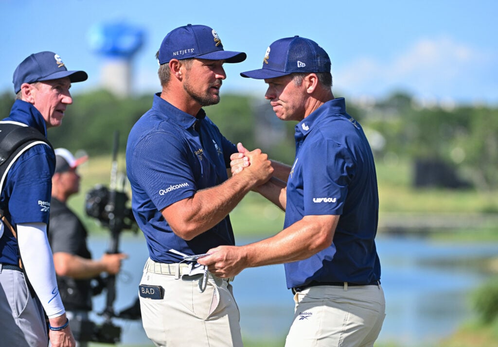 Crushers GC teammates Bryson DeChambeau (left) and Paul Casey (right) shake hands at LIV Golf Dallas