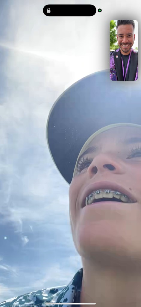 A kid FaceTime calls his dad.