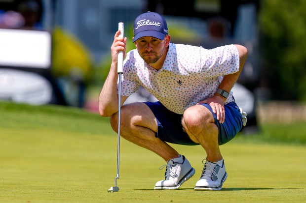 Mt. Pleasant's Chris Gentle reads the green at No. 2 during the second round of the 100th Lowell City Golf Tournament on Friday at Long Meadow Golf Club. (James Thomas for the Lowell Sun)