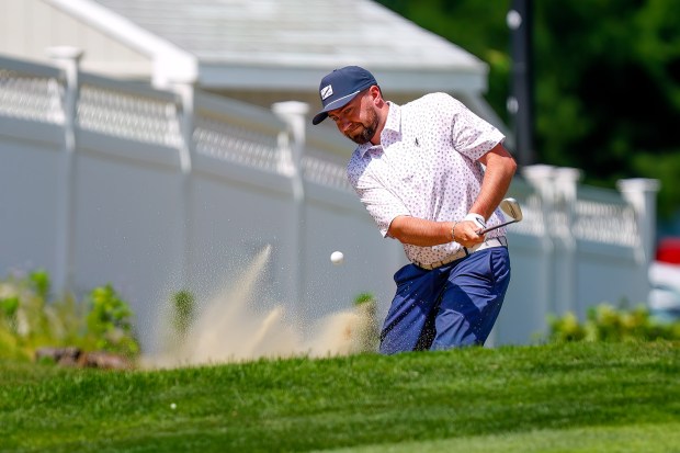 Andrew Mierzwa of Mt. Pleasant Golf Club plays from bunker during Friday's second round of the 100th Lowell City Golf Tournament at Long Meadow Golf Club. (James Thomas for the Lowell Sun)