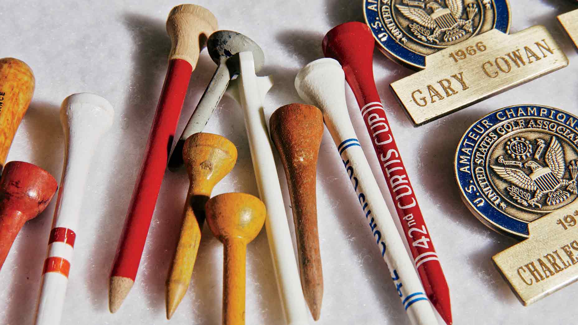 Among the countless array of trinkets in the Merion archive are tees, pens and USGA contestants’ badges.