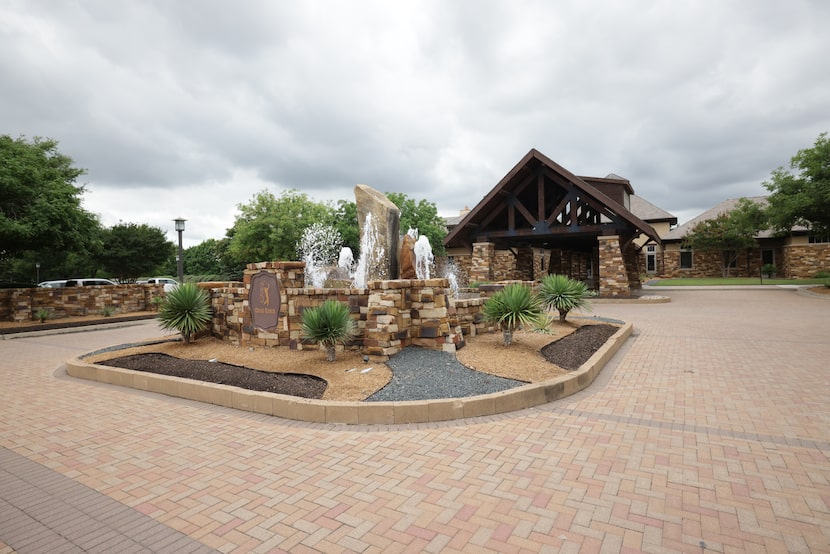 Workers renovate the golf course at the Craig Ranch Country Club in McKinney, Texas, on Jun...