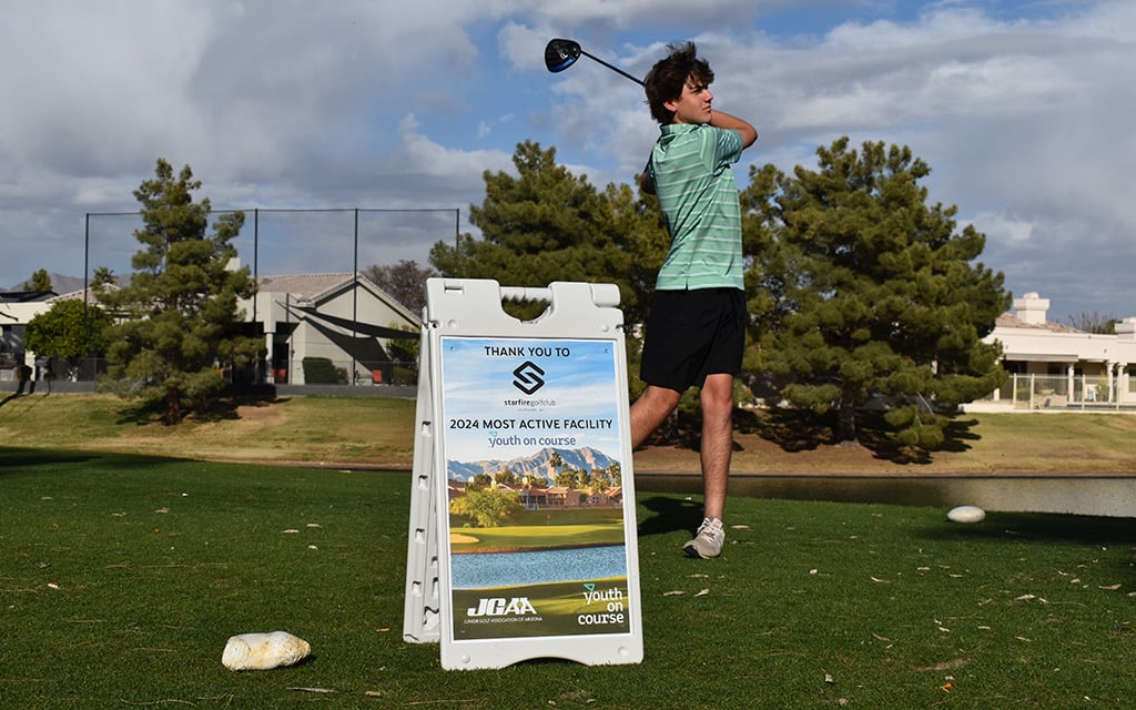 A young golf athlete swings at Scottsdale's Starfire Golf Club.