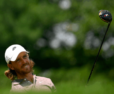Tommy Fleetwood hits a mini driver off the tee