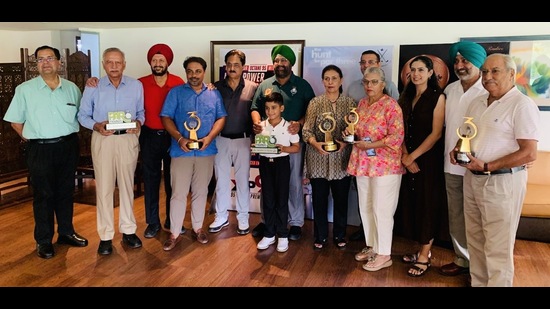 Winners of the Par 3 Masters Golf Tournament held at Chandigarh Golf Club on Saturday. (HT Photo)