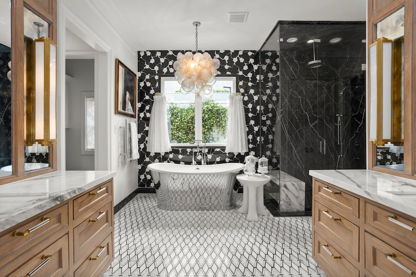 Bathroom with freestanding tub and separate shower