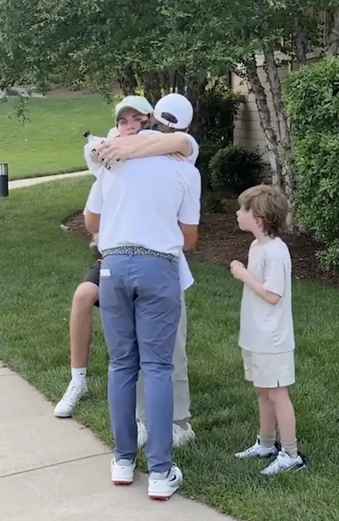 Tommy Fleetwood embraces his wife, Clare, after the Travelers Championship. PGATour/X