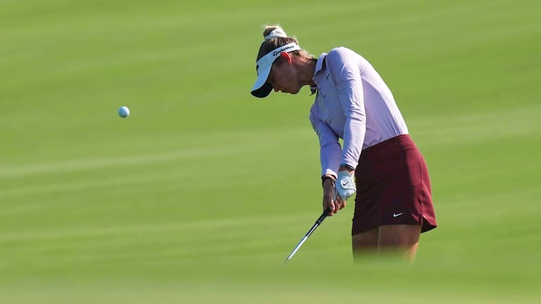 Nelly Korda hits to the third green during the first round of the Women's PGA Championship golf tournament.