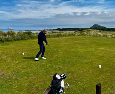 Fergus playing a shot at North Berwick