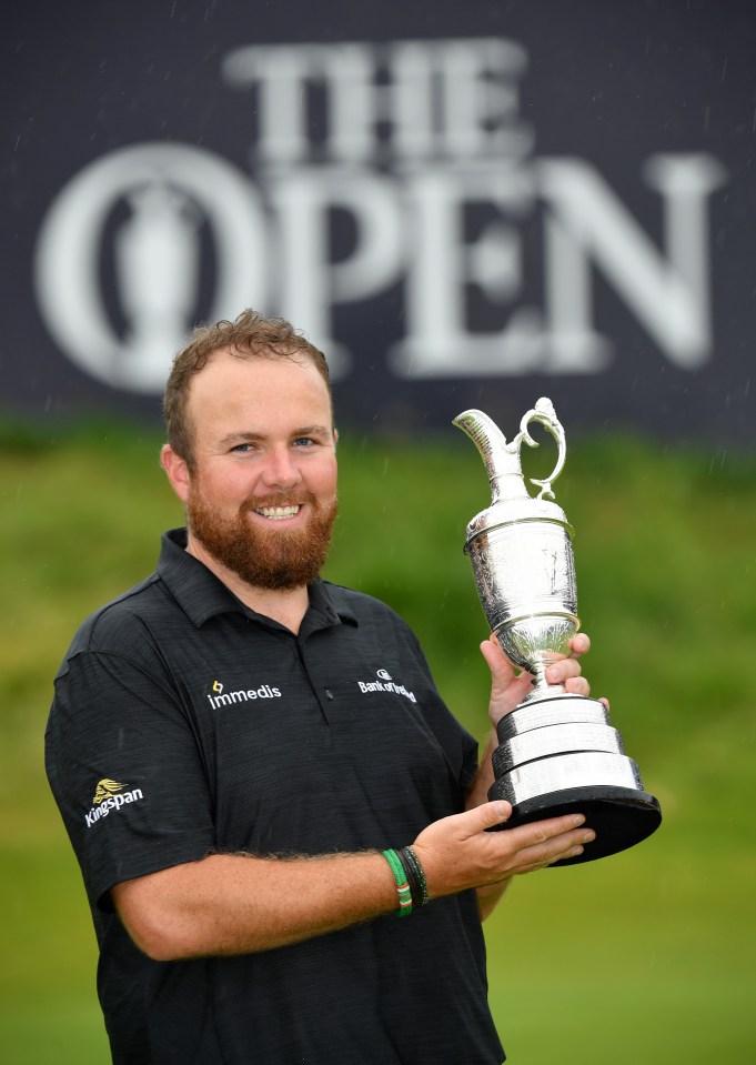 Shane Lowry holding the Claret Jug after winning The Open.