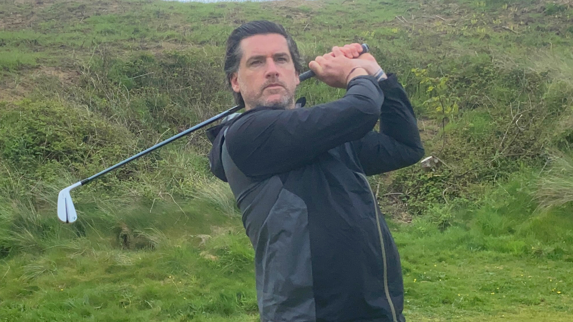 Photo of Joe Ferguson testing the TaylorMade P-UDI Utility Iron