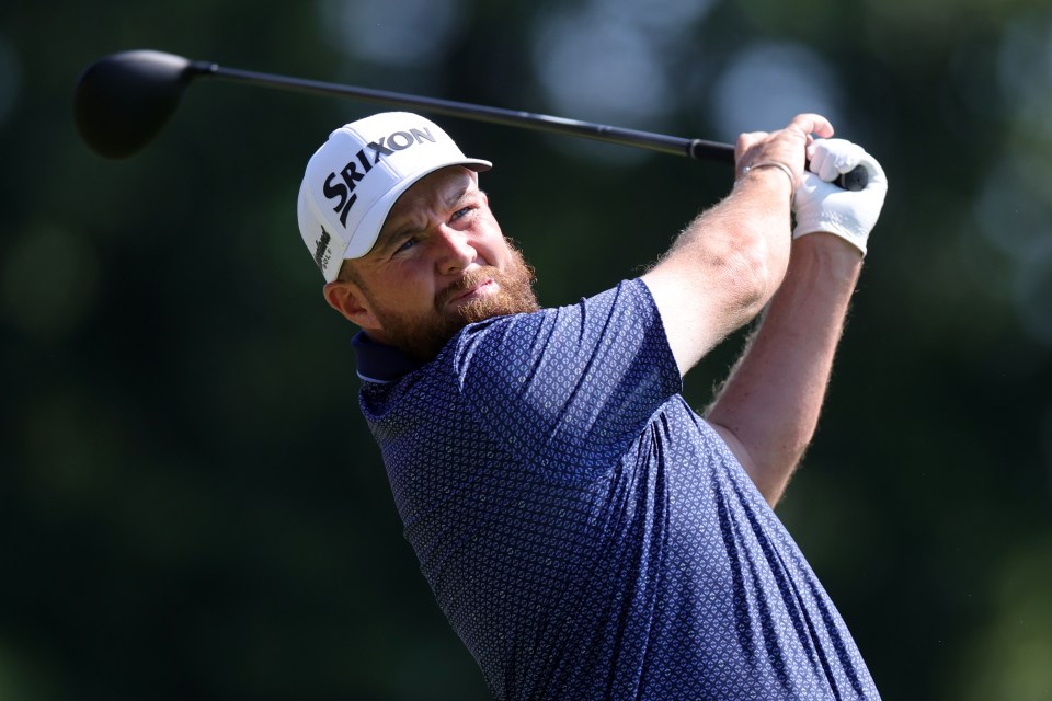 Shane Lowry of Ireland taking a golf shot.