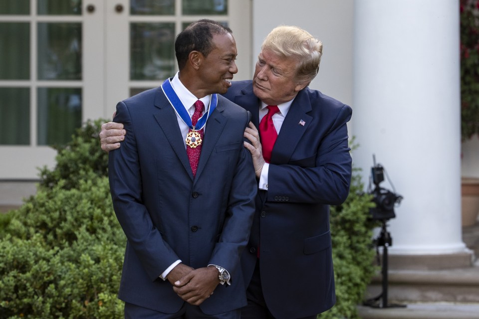 President Donald Trump awarding Tiger Woods the Presidential Medal of Freedom.