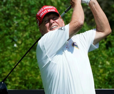 Donald Trump hits a drive