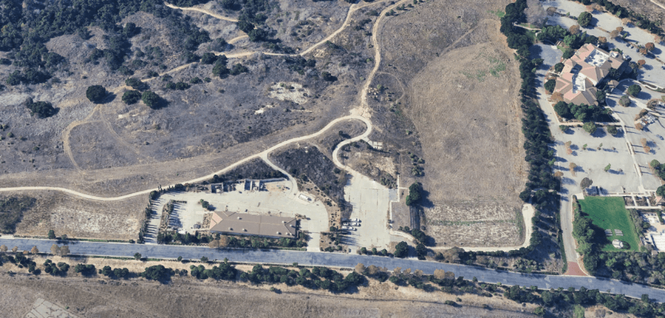 The course is no longer covered in lush green grass, and trees have also appeared