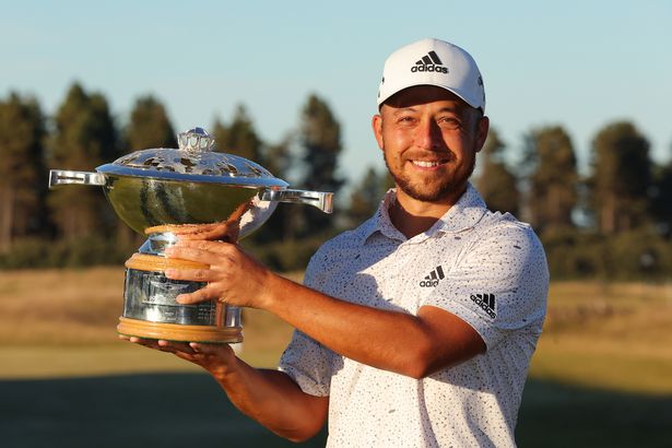 NORTH BERWICK, SCOTLAND - JULY 10:  Xander Schauffele of the United States poses with the trophy after winning the Genesis Scottish Open at The Renaissance Club on July 10, 2022 in North Berwick, Scotland. (Photo by Kevin C. Cox/Getty Images)
