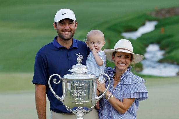 Scottie Scheffler with his wife and son