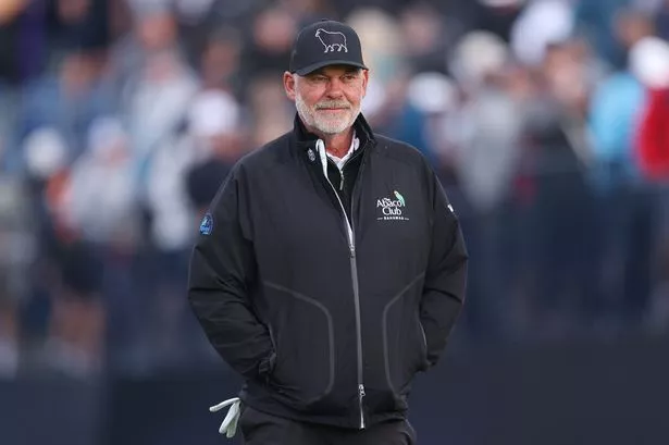 Darren Clarke looks on