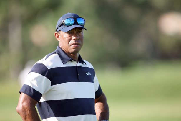 Tiger Woods watches his son Charlie Woods play during the first round of the U.S. Junior Amateur at Brook Hollow Golf Club on July 21, 2025 in Dallas, Texas