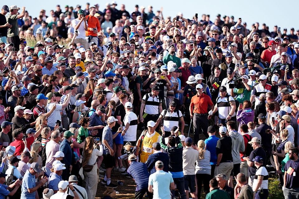 Rory McIlroy walks through the crowd after playing a shot on the 17th during day three (Photo by Mike Egerton/PA Images via Getty Images)