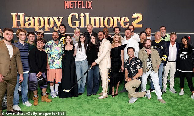 Adam Sandler and the rest of the Happy Gilmore 2 cast pose for a group snap at Lincoln Center