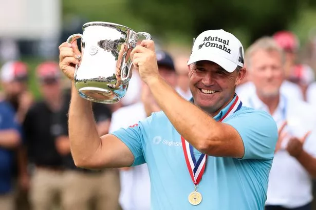 Padraig Harrington of Ireland hoists the Francis D. Ouimet Memorial Trophy after winning the U.S. Senior Open Championship 2025 at Broadmoor Golf Club on June 29, 2025 in Colorado Springs, Colorado