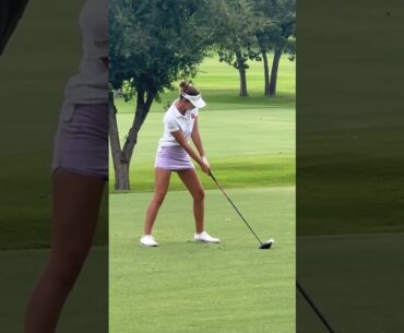 Golfers golfing