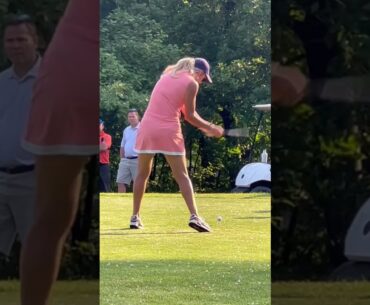 Golfers golfing