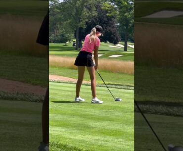 Golfers golfing