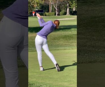 Golfers golfing