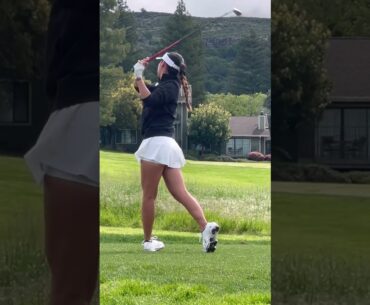 Golfers golfing