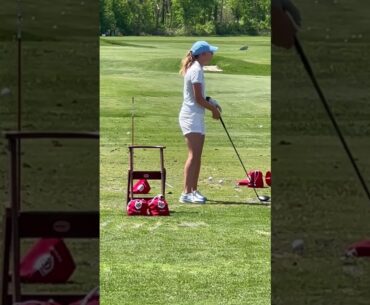 Golfers golfing