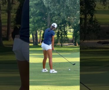 Golfers golfing