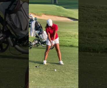 Golfers golfing