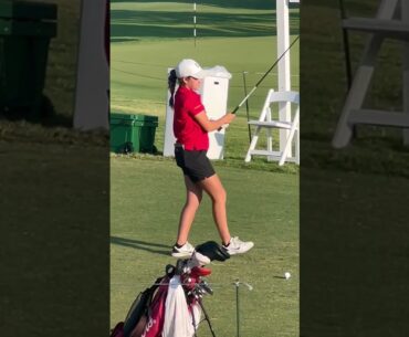 Golfers golfing